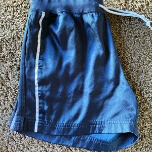 Women’s blue Nike shorts                             Zelle blue biker shorts